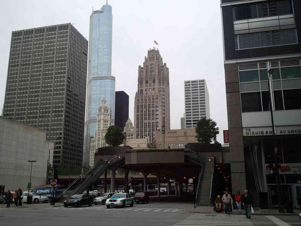 View of downtown Chicago. The building in the center with the flag on top of it is the Chicago Tribune building. The Chicago Tribune was started in 1847. The building was under construction from 1920 - 1925.