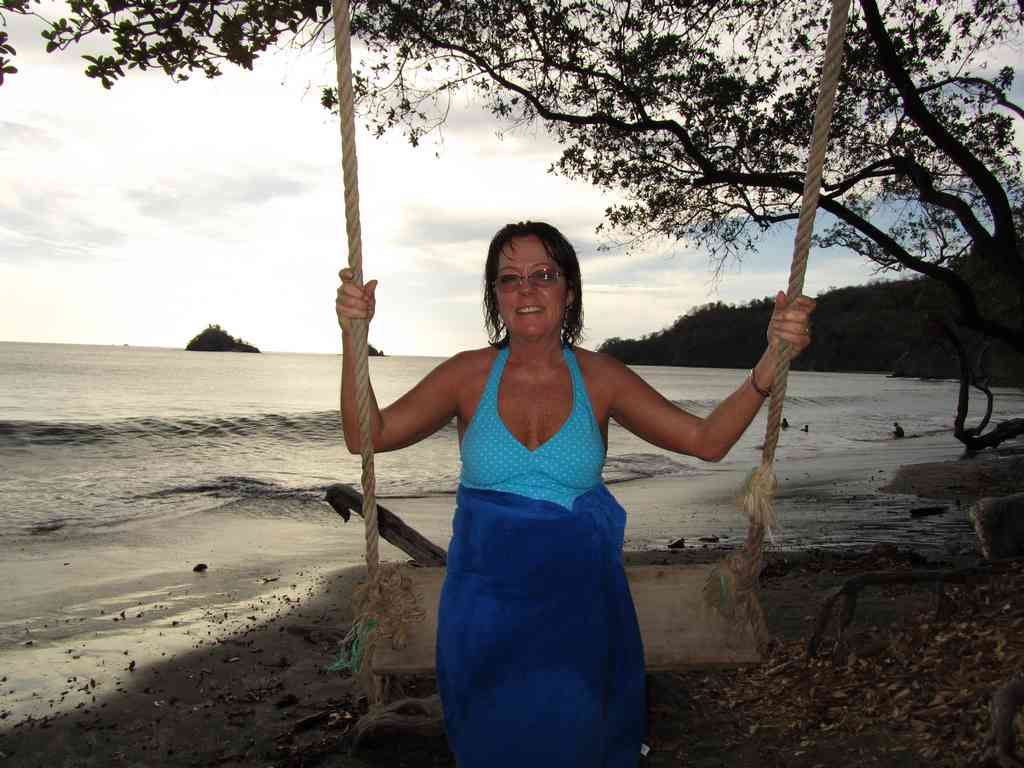 There was an awesome swing hanging from a tree, so I snapped a picture of Dee Dee...