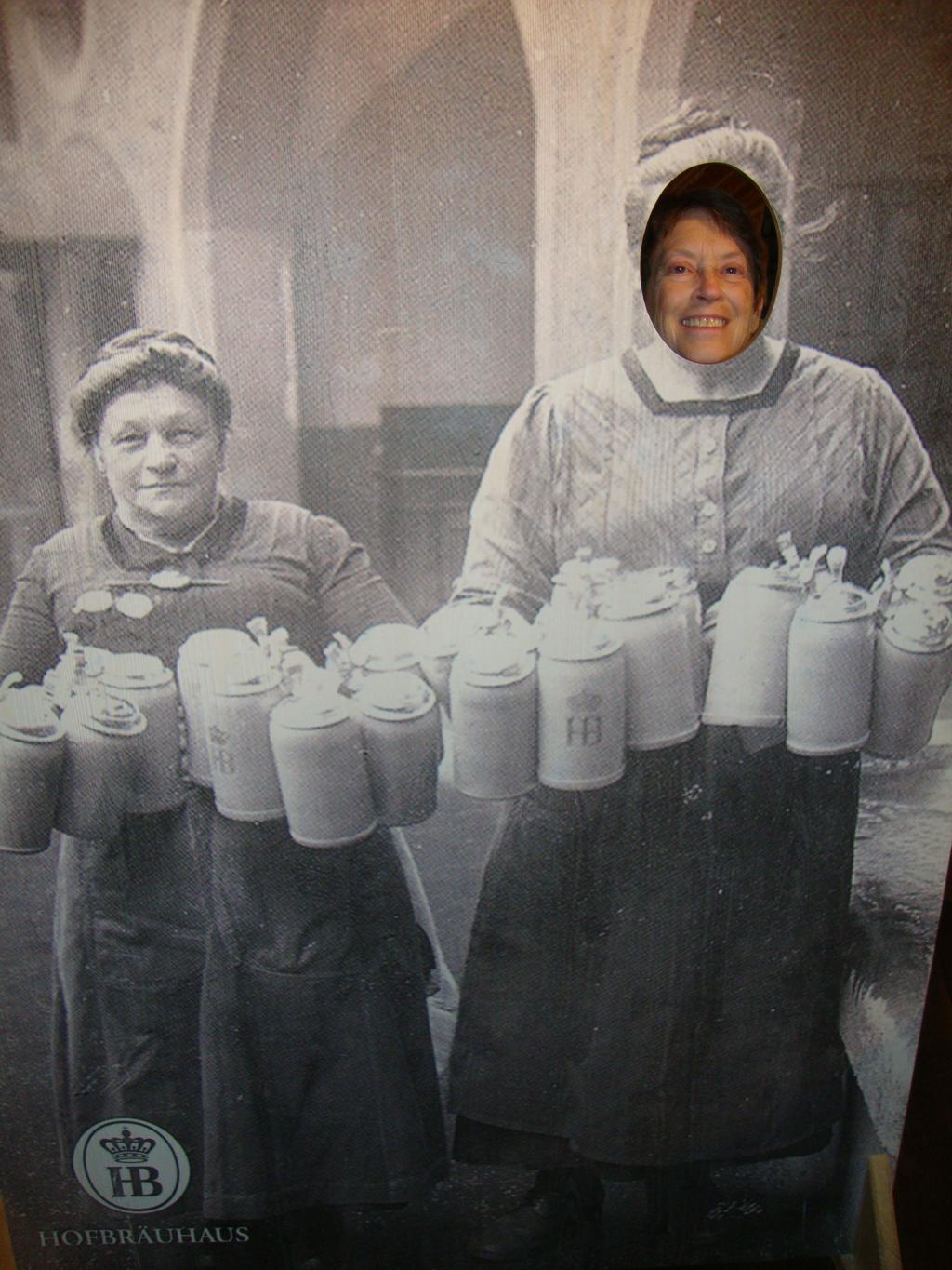 Helen proudly serving beer at the legendary Hofbr&auml;uhaus, which was established in 1589!