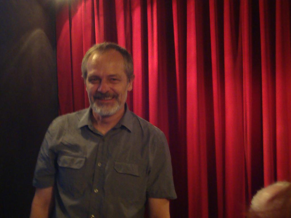 Oliver in front of the stage.