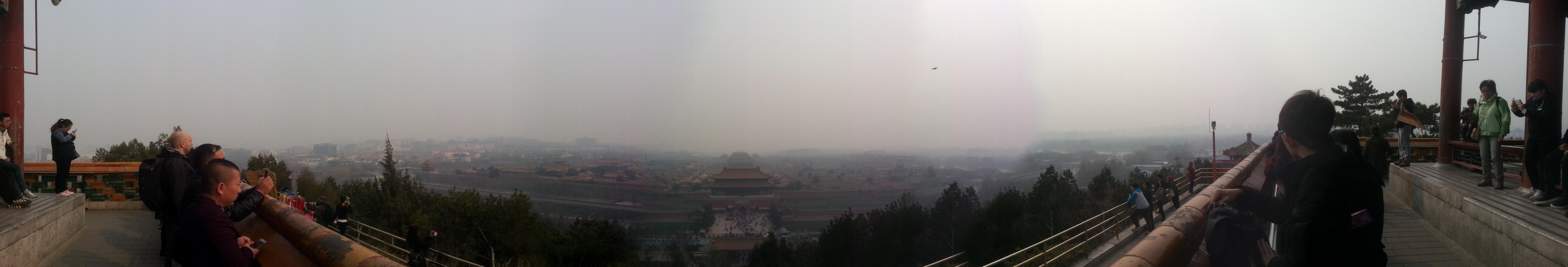 Looking down over the spectacular golden roofs of the Forbidden City from the top of the park.