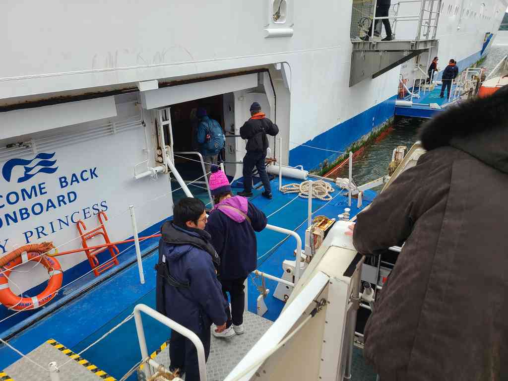 Boarding the ship from the shuttle craft.